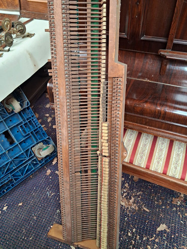 Brown wood upright piano - brown,
